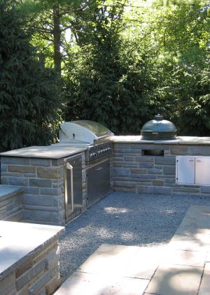 Custom outdoor kitchen grill structure bench seating