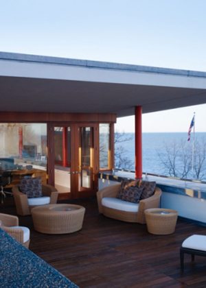 Modern deck overlooking Lake Michigan with American flag in background
