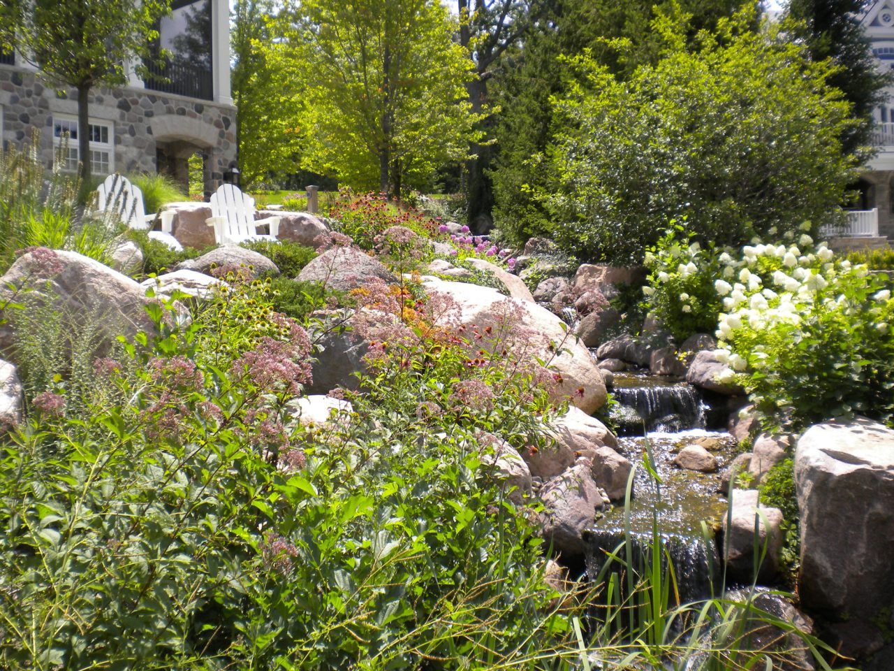 Natural flower garden with babbling brook