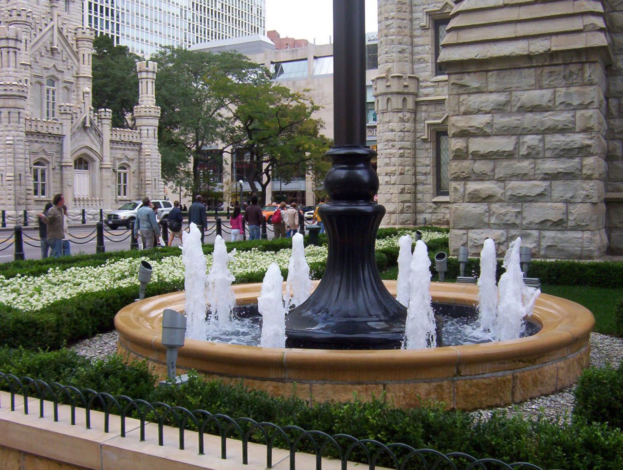 Chicago Water Tower fountain amongst urban background